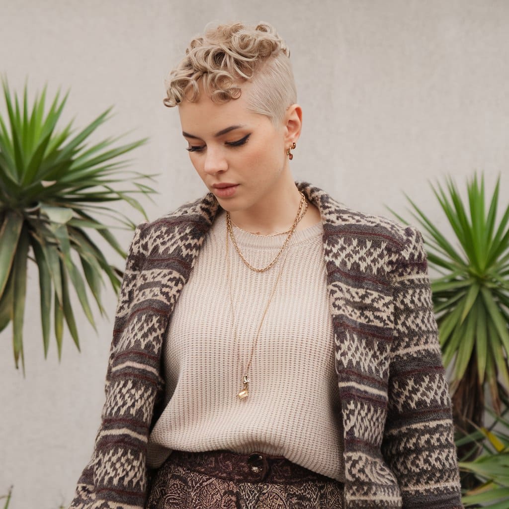 Pixie Cut with Curly Mohawk and Faded Sides